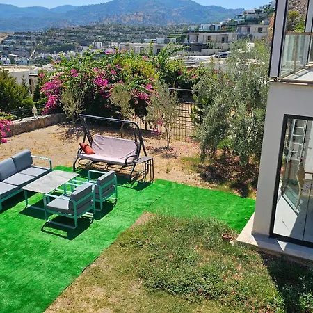 Guendogan Bahceli Plaj Kullanimli Iyi Esyali Begonvilli Yeni Ev Apartament Bodrum