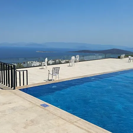 Guendogan Bahceli Plaj Kullanimli Iyi Esyali Begonvilli Yeni Ev Apartament Bodrum